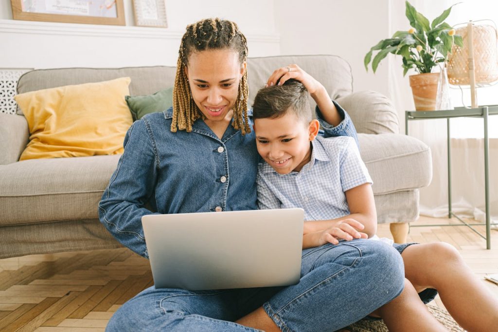 mother and child with their laptop